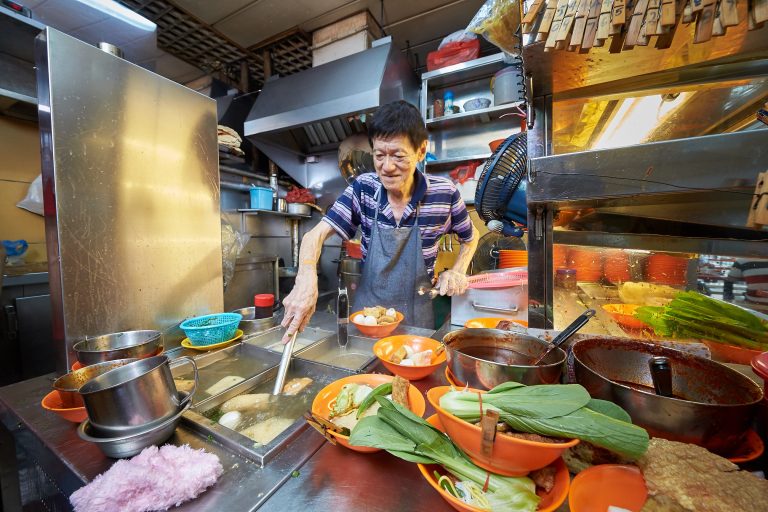 Hawker preparing meals