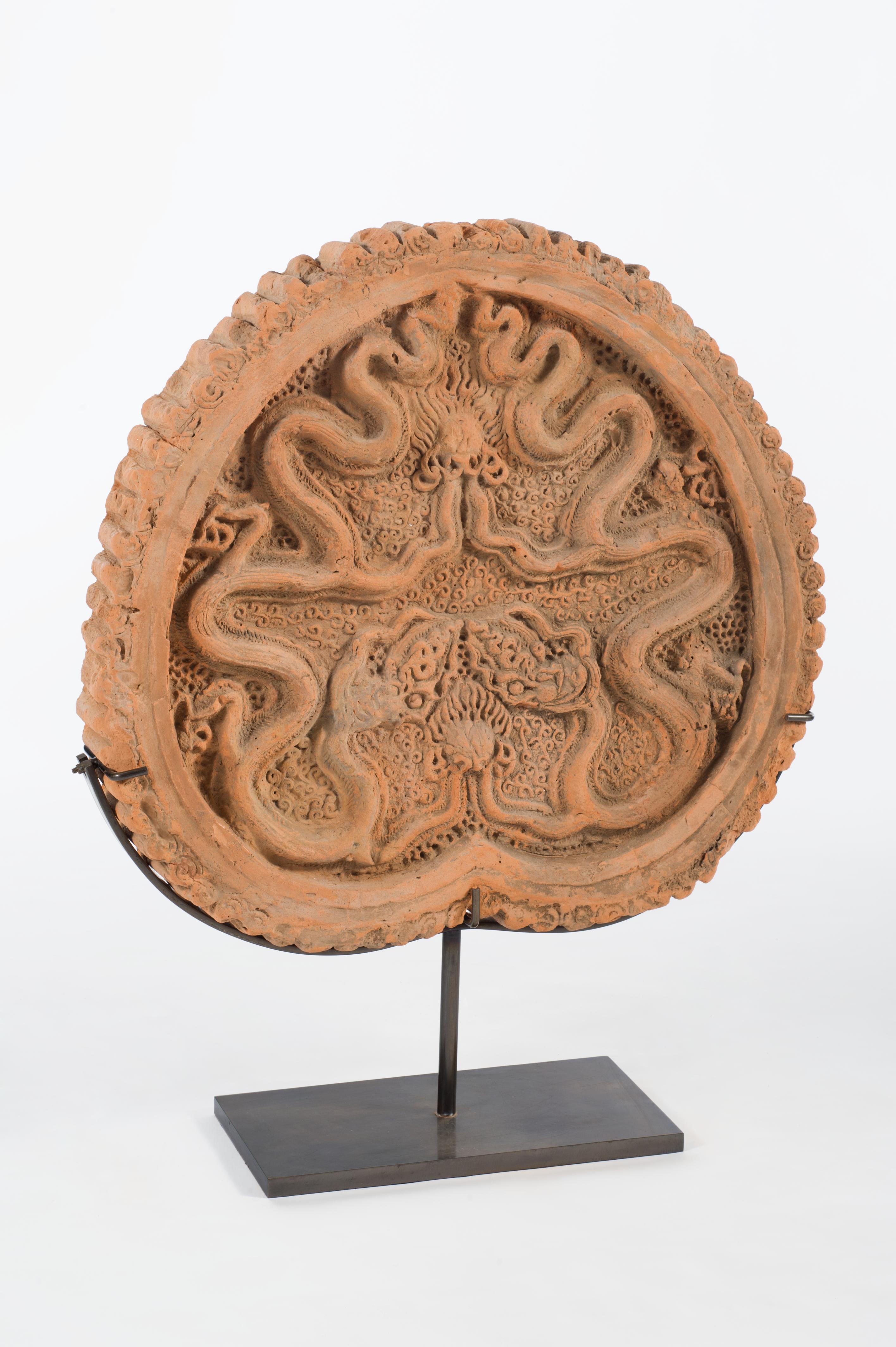 Tile with dragons