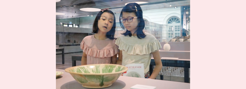 Image of children looking at museum object in Asian Civilisations Museum, Singapore