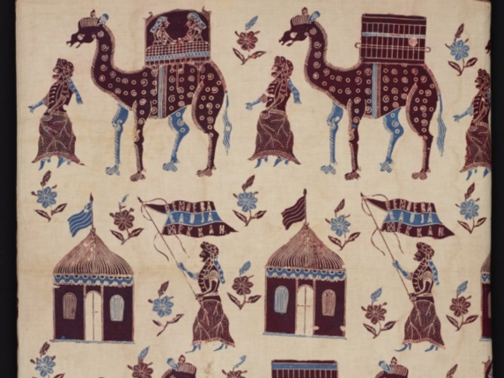 Beige and brown batik sarong cloth with camels and tents